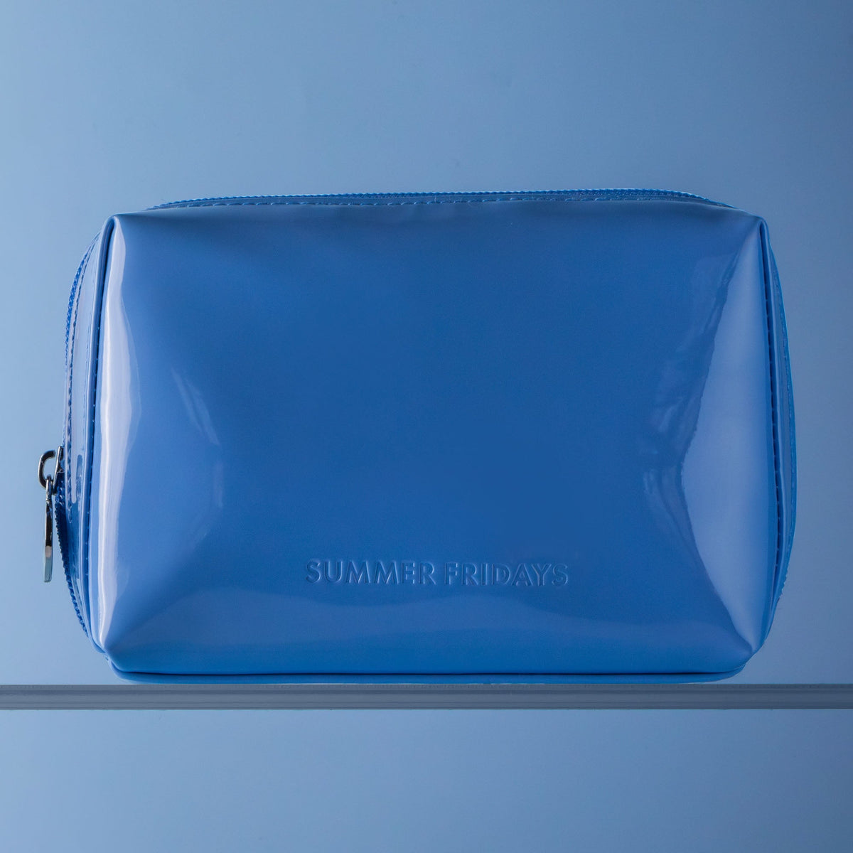 glossy-pouch-in-jet-lag-blue-a1 Glossy-Pouch-Jet-Lag-2.jpg
