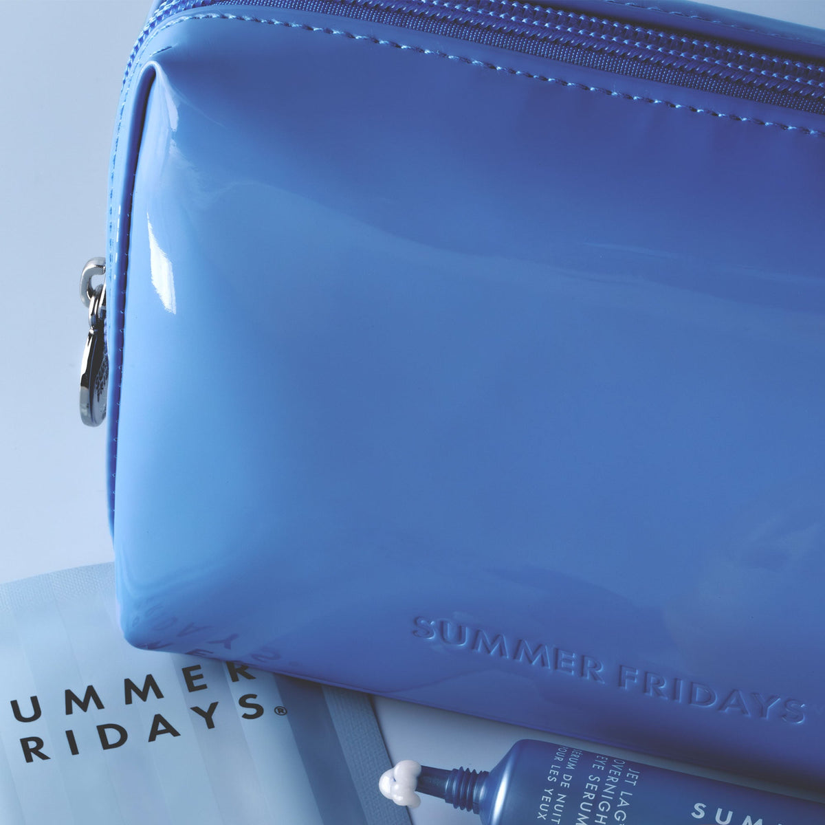 glossy-pouch-in-jet-lag-blue-a1 Glossy-Pouch-Jet-Lag.jpg